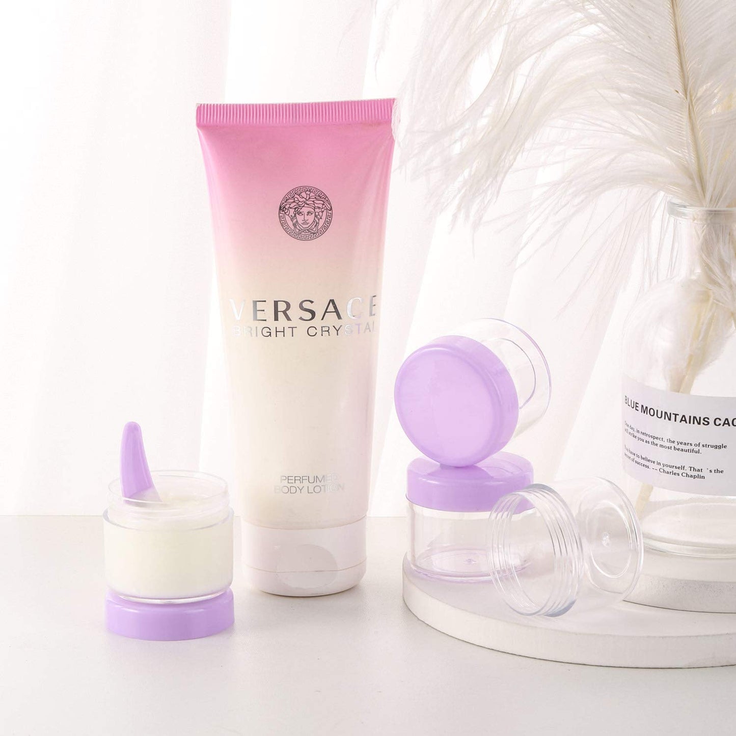 Refillable Cosmetic Sample Jars - 100 Pack 20g (0.7oz) Purple Small Travel Containers with Lids + 10 Mini Makeup Spatulas - BPA Free